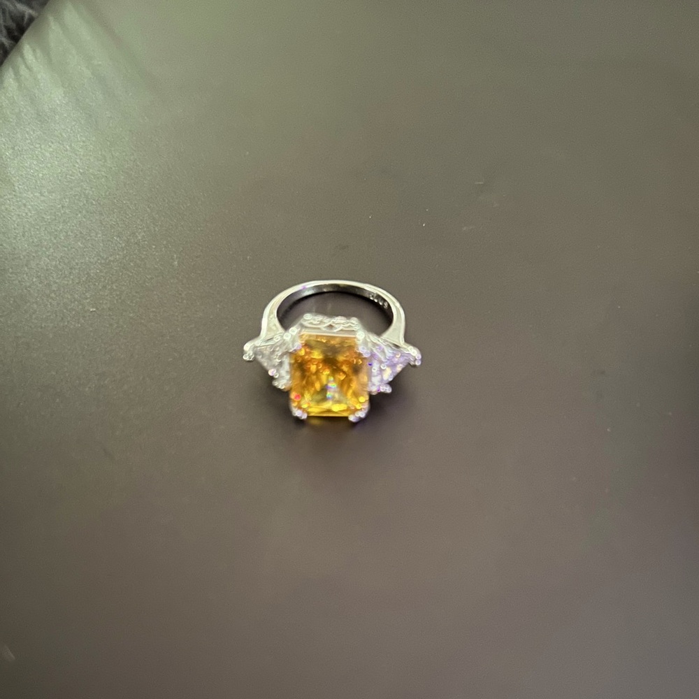 Yellow diamond ring.  Cubic zirconia.